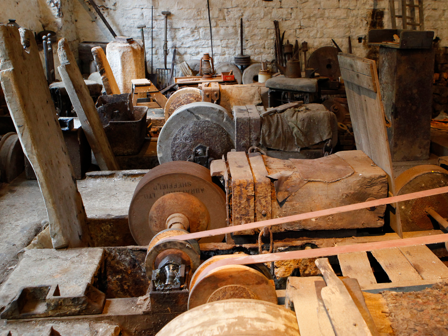 A room full of water powered machinery at the Shepherd Wheel Workshop.