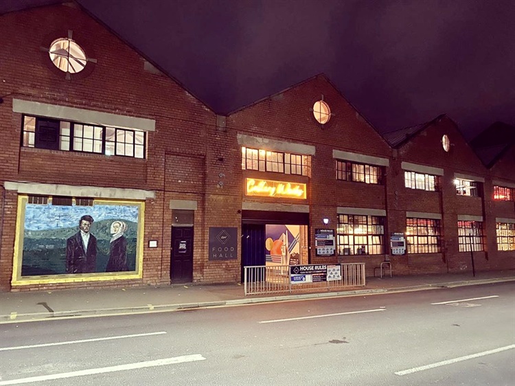 An urban street, at night, in Kelham Island, Sheffield.
