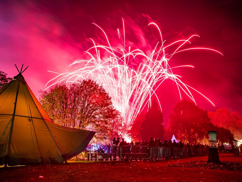 The Glass House and the Sheffield Botanical Gardens are lit up by a huge display of colourful lights.