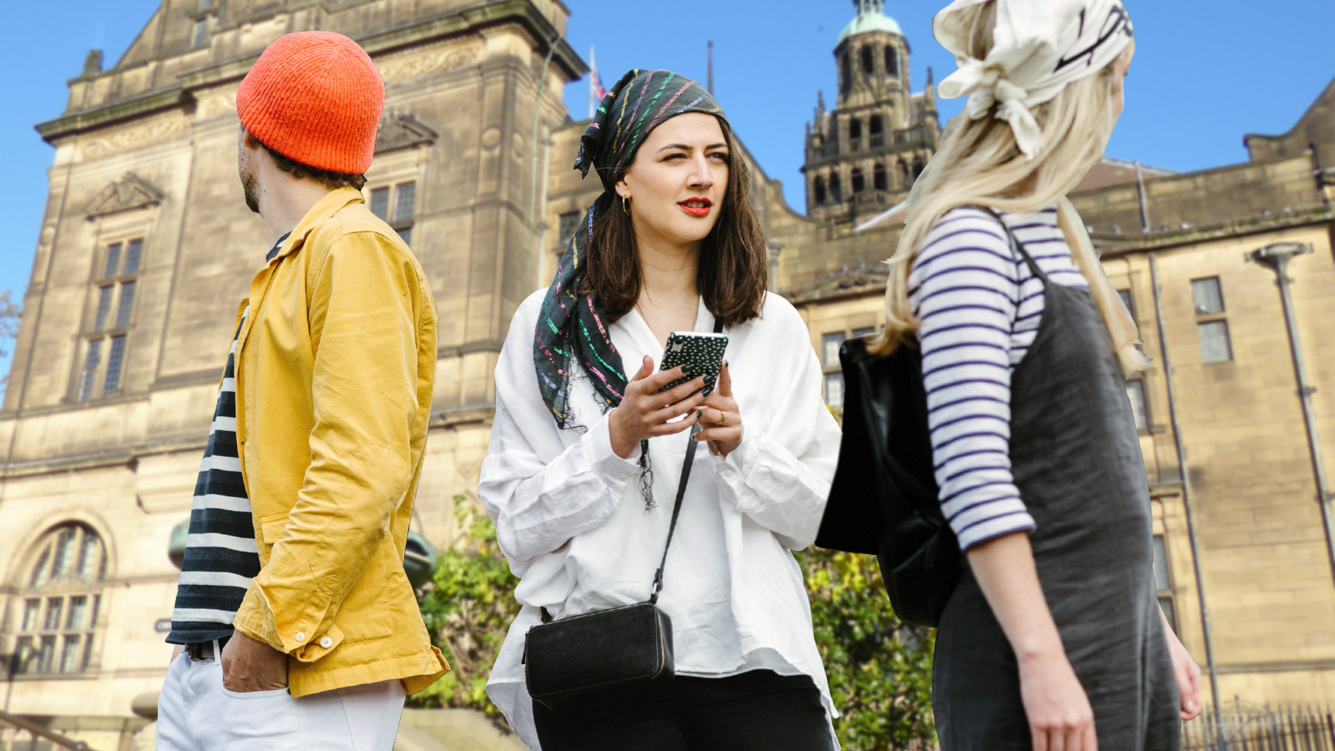 Three people having fun on a treasure hunt in Sheffield.
