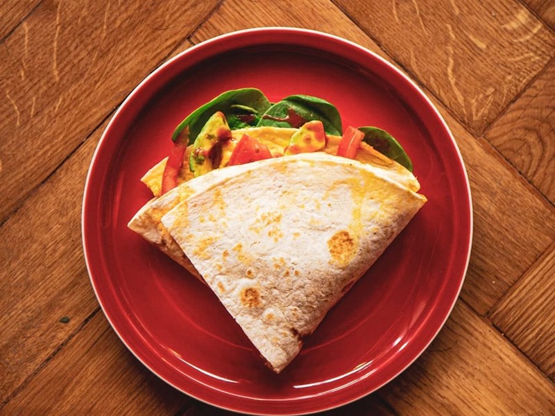 A wrap on a red plate.