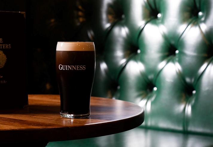 A booth and a pint of Guinness at The Foresters.