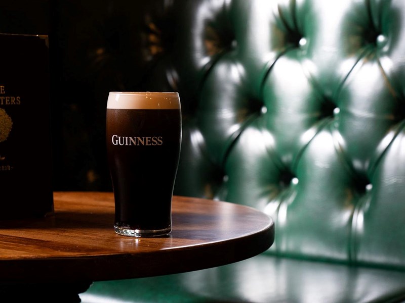A booth and a pint of Guinness at The Foresters.