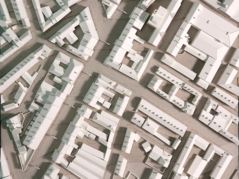 An architects model of city buildings, seen from above.