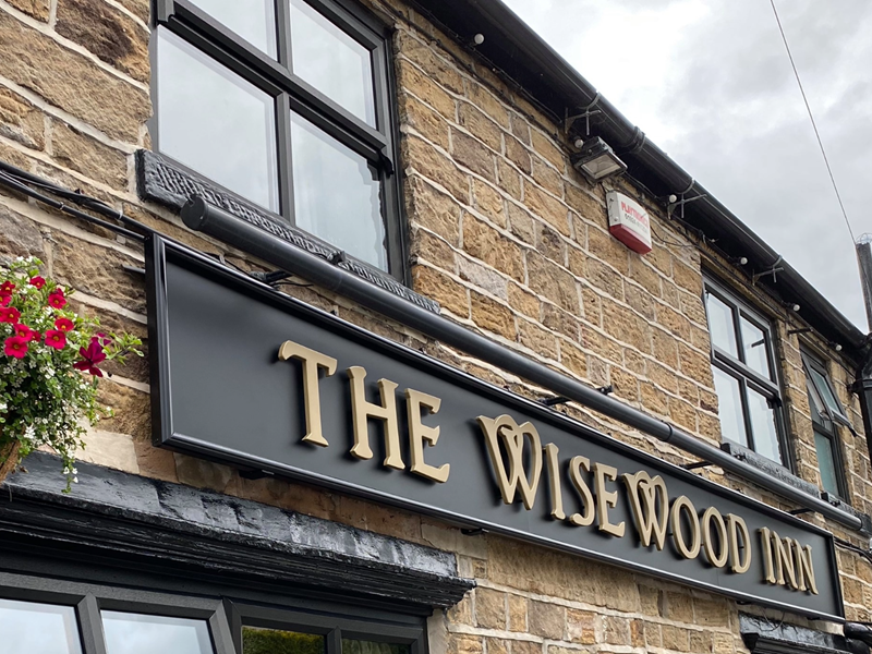 The sign above the door at The Wisewood Inn.