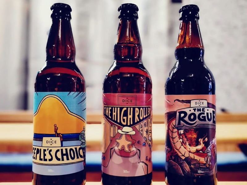 Three bottles of beer on a table at The Dice Box Sheffield.