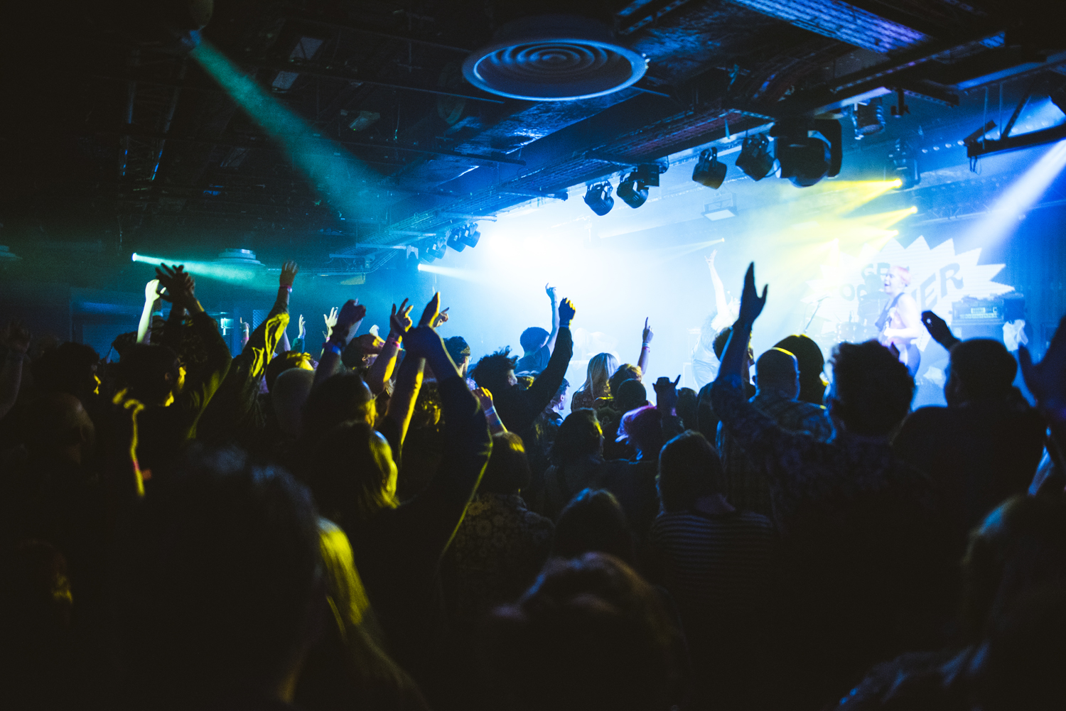 A crowded night club in full swing. 