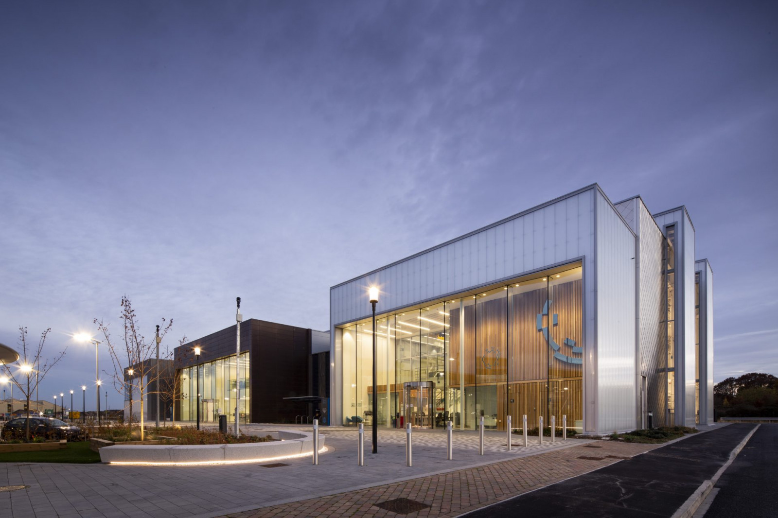 An exterior shot of Laboratory for Verification and Validation a the AMRC, at dusk.