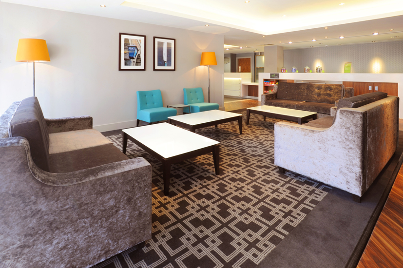 Relaxing hotel seating area at Hampton by Hilton Sheffield for guests to unwind.