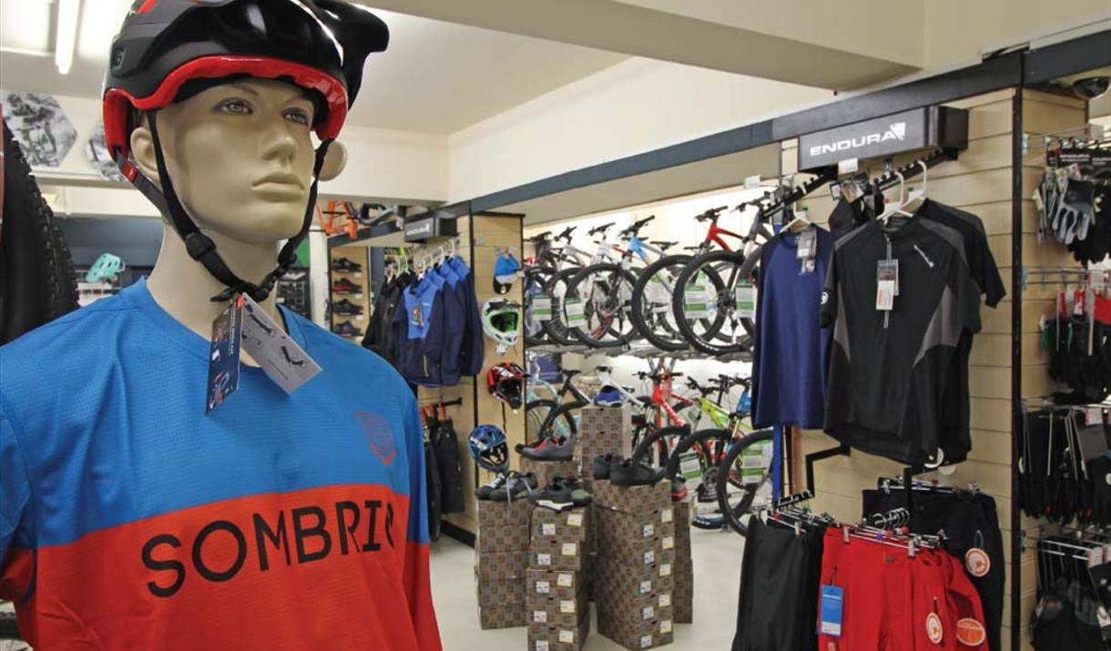 A mannequin wearing cycling clothing inside the showroom at JE James Cycles Sheffield.