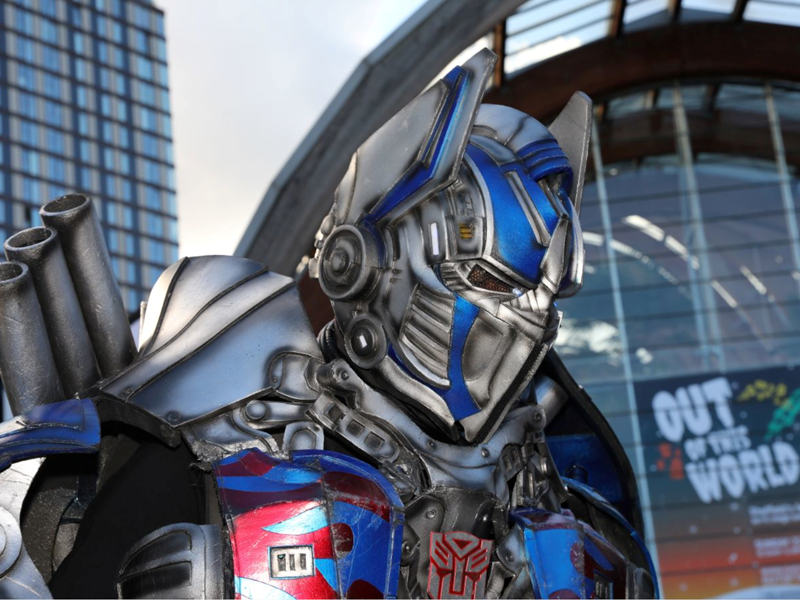 A performer dressed as a Transformer outside the Sheffield Winter Garden.