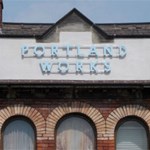 The sign high up above the entrance to Portland Works.