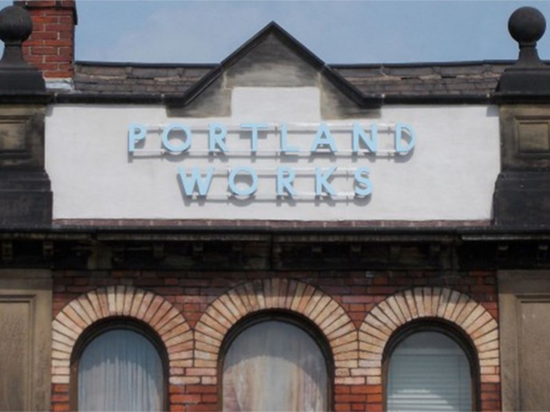 The sign high up above the entrance to Portland Works.