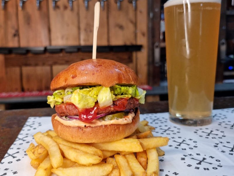 A burger and a pint of beer.