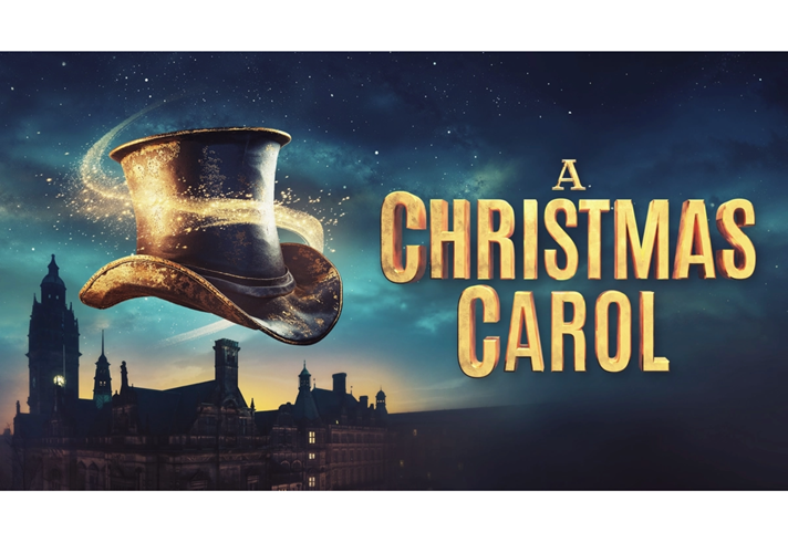 A night sky at dusk with the silhouette of Sheffield's town hall building. In the foreground, a black Victorian top hat floats, swirled with a golden sparkly light. Text reads: A CHRISTMAS CAROL