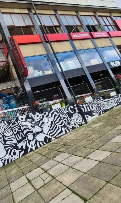 Exterior of Plot 22, which is decorated by several murals.