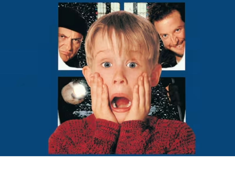 The classic image from the film, with a boy (played by Macaulay Culkin) screaming and holding his hands to his face, while behind him the two villains of the film look in through the window.