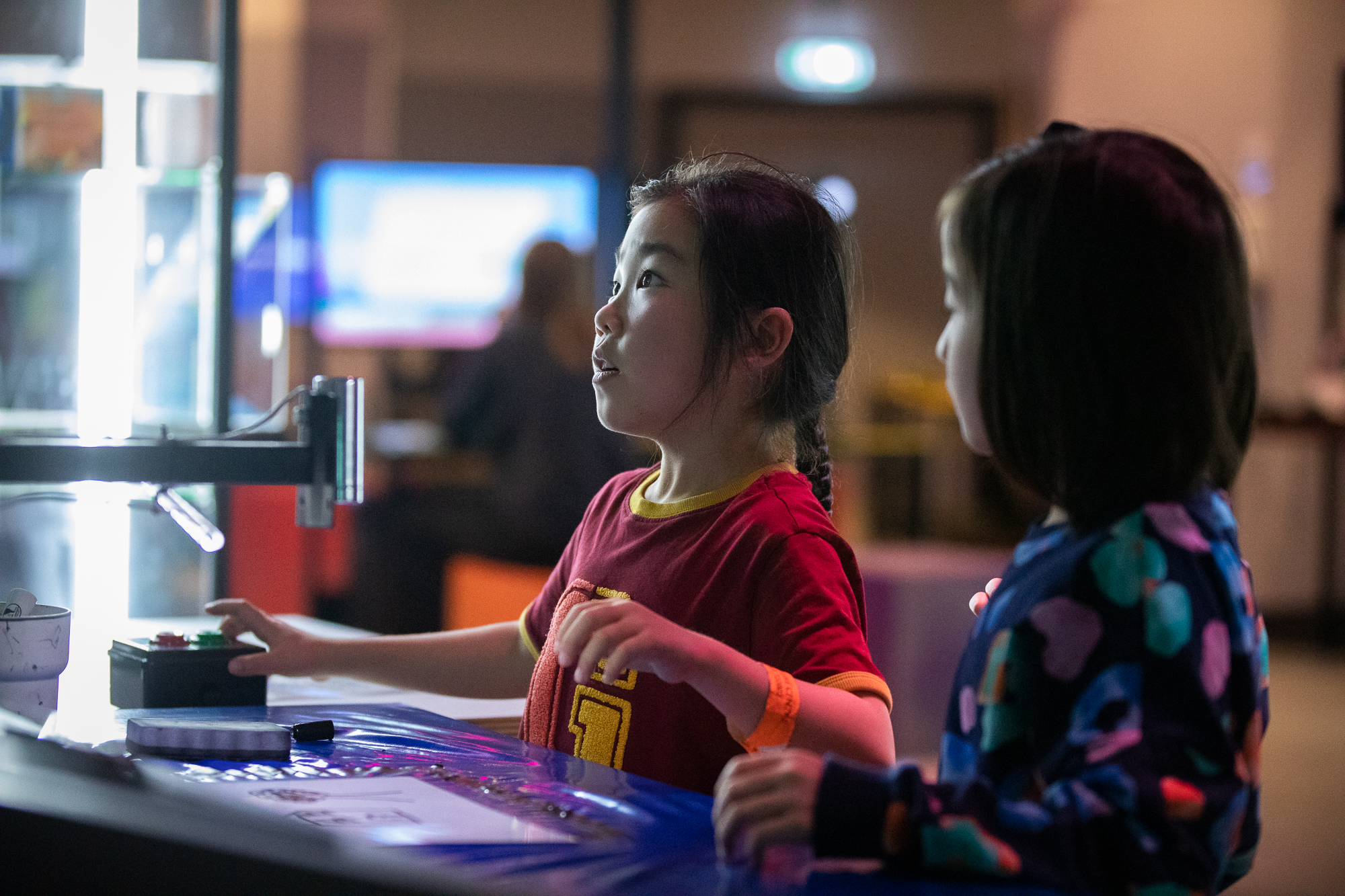 Two children playing games at The National Videogame Museum