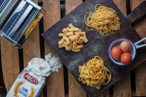 A table full of food at Nonnas Restaurant.