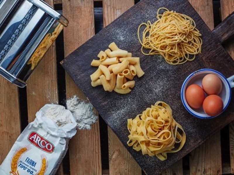 A table full of food at Nonnas Restaurant.