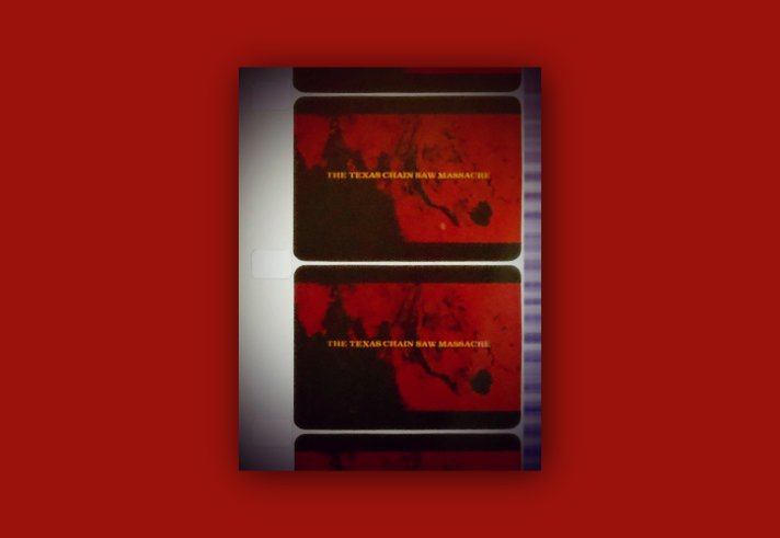 Three frames of film stock, showing the opening title for The Texas Chain Saw Massacre.