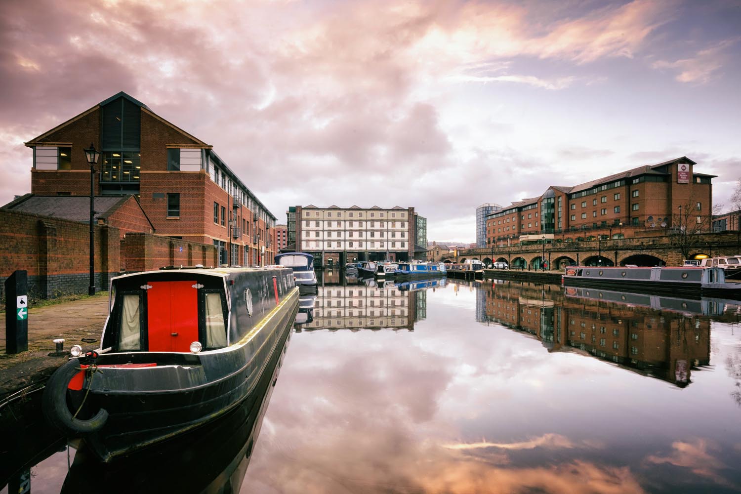 Canal boats moored at Victoria Quays in Sheffield city centre.