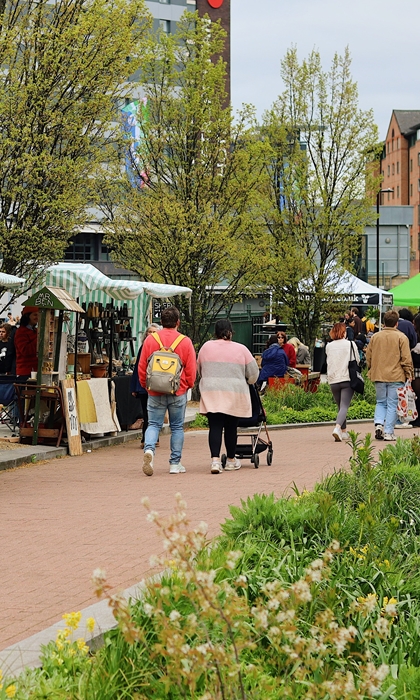 Crowds walking along Pollen Market