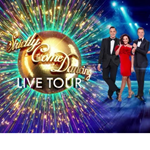 Promotional graphic for the “Strictly Come Dancing Live Tour.” It features a large golden disco ball with the show’s logo in elegant script, surrounded by colourful light bursts. Four people in formal and dance attire stand on a stage with bright blue spotlights in the background.
