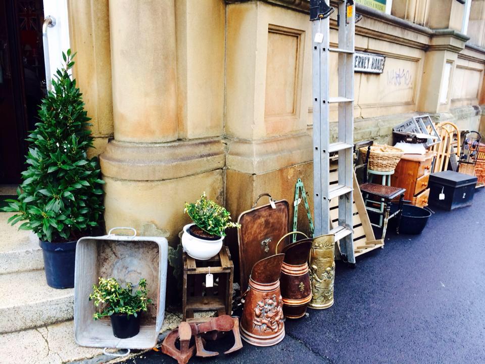Various antiques piled up outside Heeley Bank Antiques Centre.