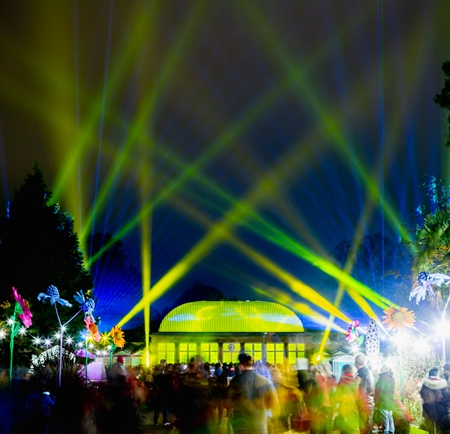 The Glass House and the Sheffield Botanical Gardens are lit up by a huge display of colourful lights.