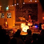 A band plays live in The Lescar.
