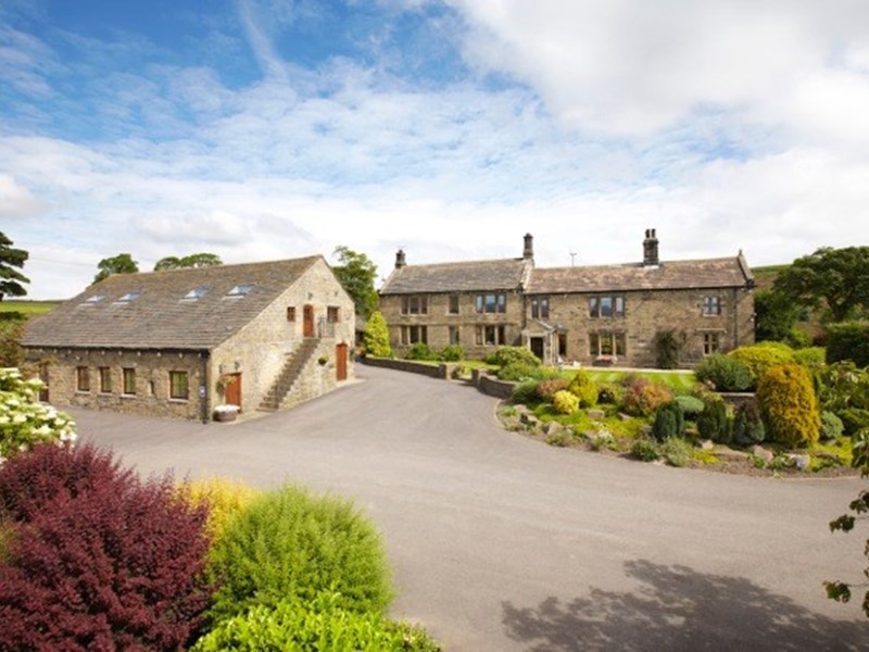 Lovely one-storey and two-storey stone cottages set in beautiful grounds.