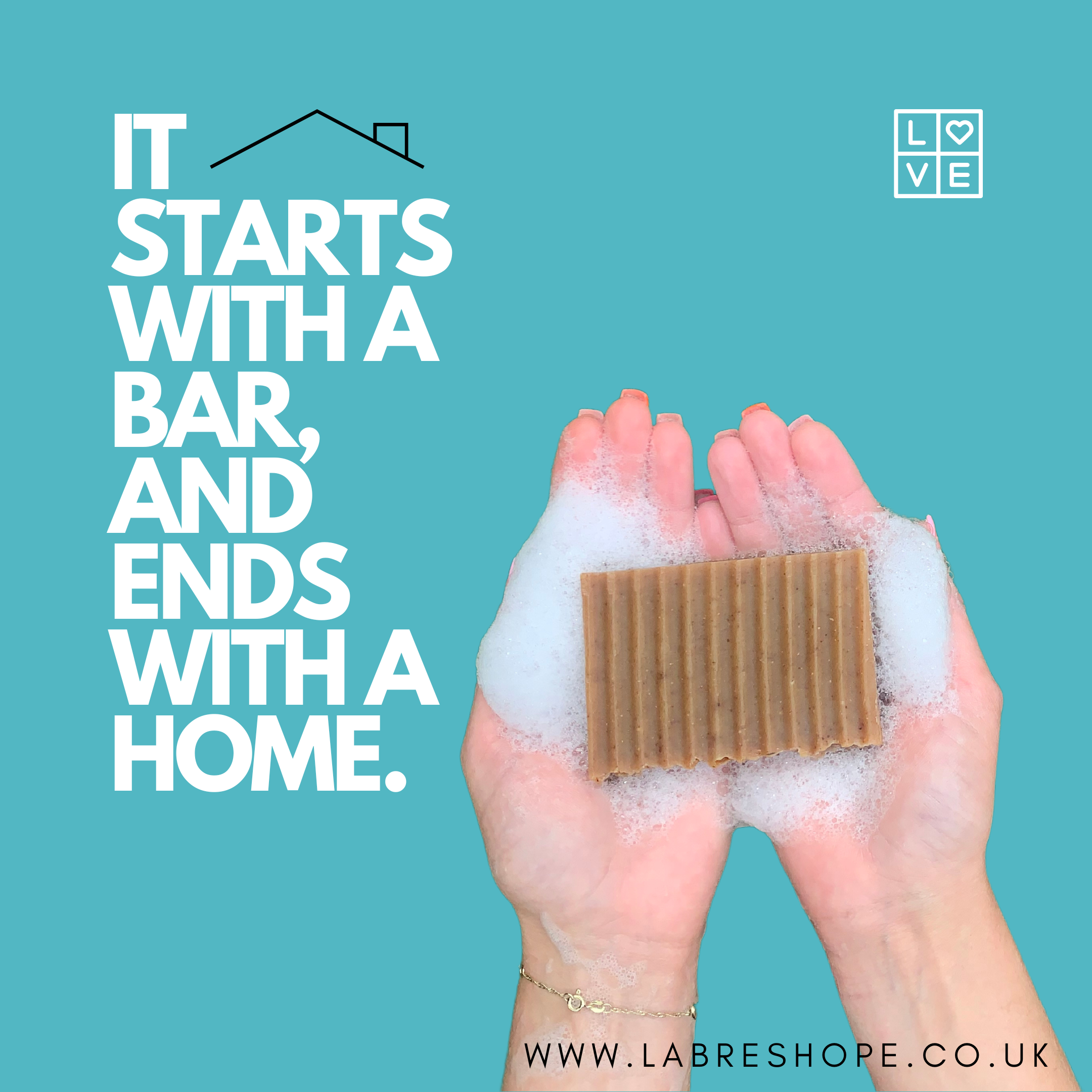Hands holding a foamy brown soap bar against a turquoise background with bold white text reading 'It starts with a bar, and ends with a home,' alongside the Labre's Hope logo and website address www.labreshope.co.uk.
