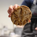 Close up of a cookie dripping in caramel