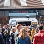A crowd of people outside at Peddler.