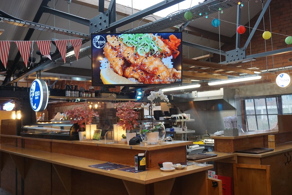 Inside Cutlery Works, filled with customers dining.