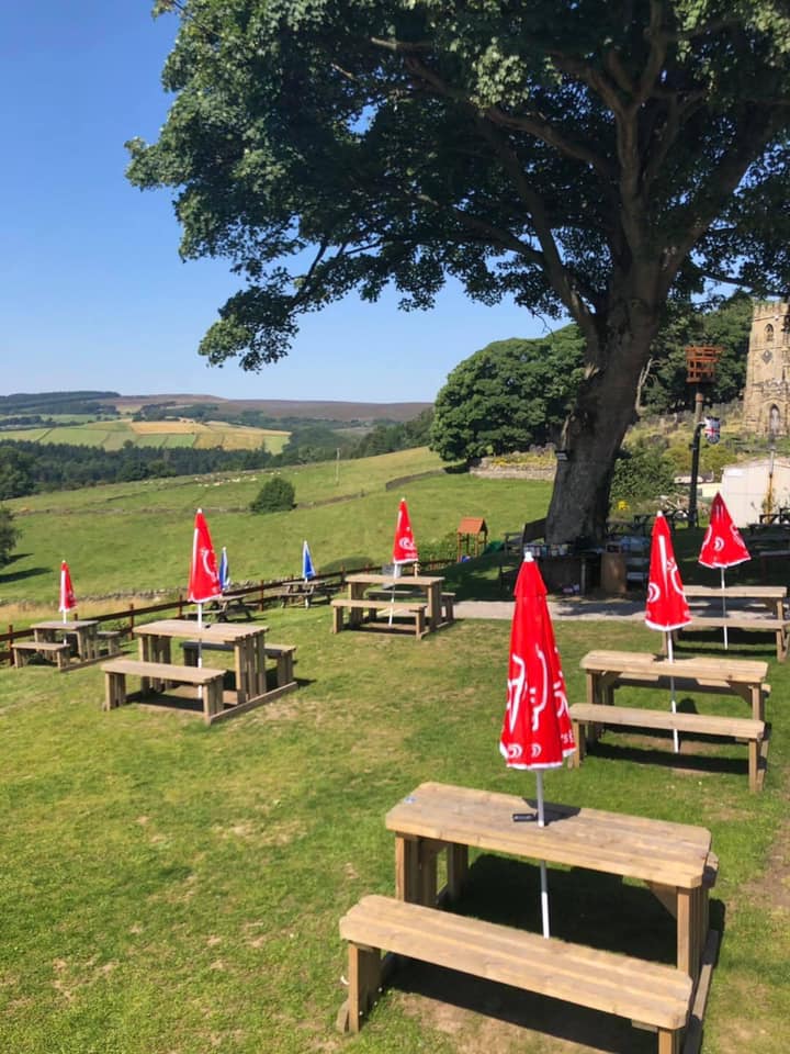 The beer garden at The Old Horns Inn, on a sunny day.