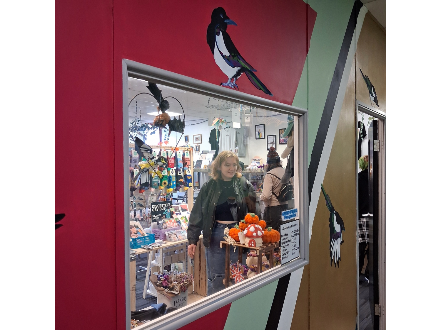 A view through a window into the interior of 7th Magpie, a little shop filled with lots of curious treasures from local makers, artists and designers.