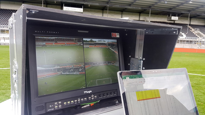 Offside VAR Technology set up next to a football pitch.