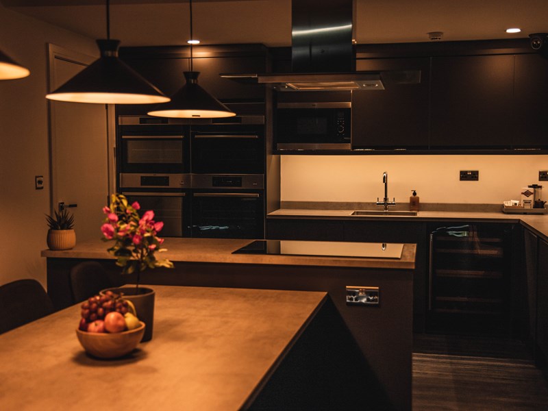 A beautiful kitchen with a 10-seat table.
