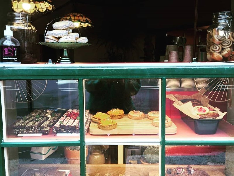 A counter stocked with backed goods at Kopi & Chai.