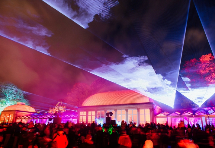 The Glass House and the Sheffield Botanical Gardens are lit up by a huge display of colourful lights.