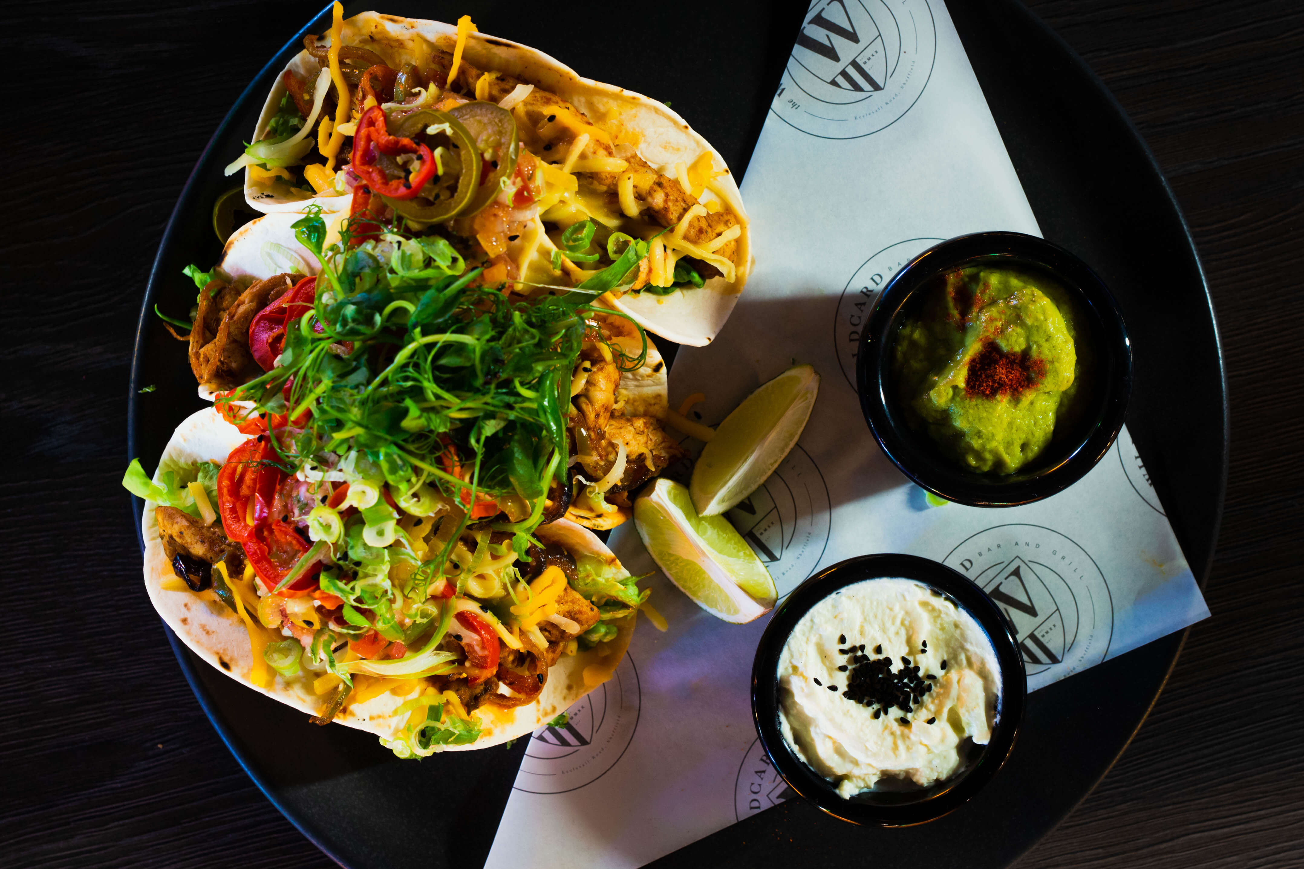 A plate full of tacos at The Wildcard Bar & Grill.