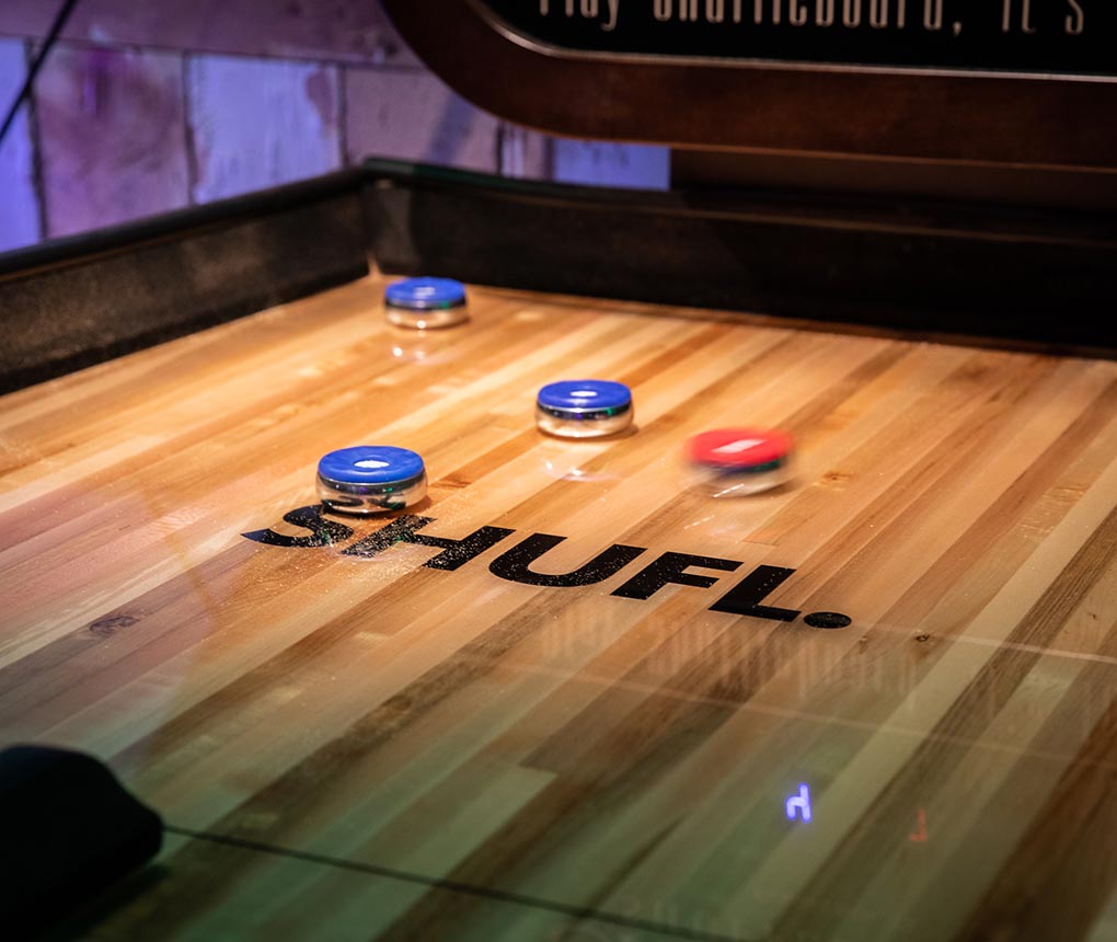 Shuffle board at Lane7
