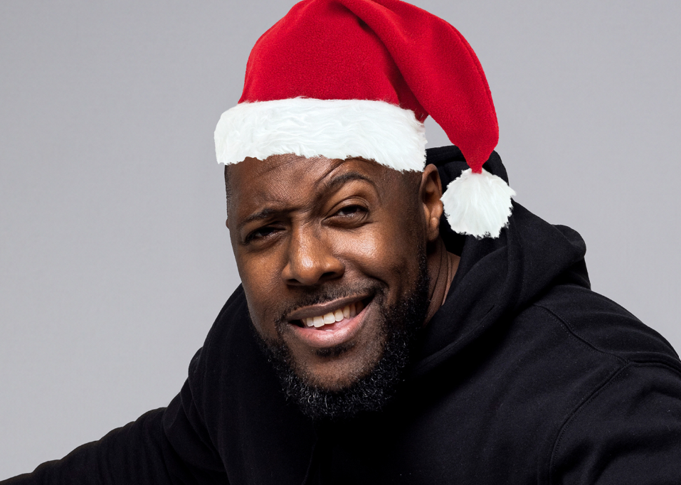 Aurie Styla wearing a Christmas hat.