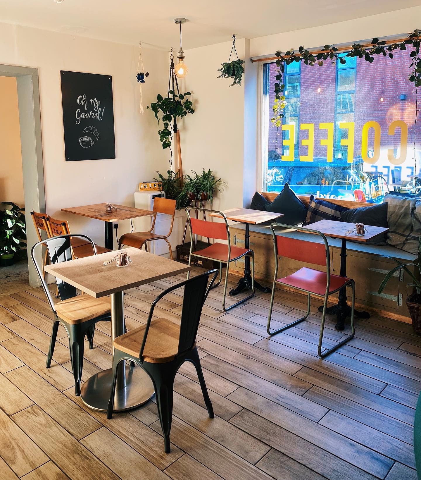 A table and chairs at Gaard Coffee Hide.
