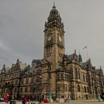 The Sheffield Town Hall, with its Victorian gothic architecture. The tall clock tower dominates the skyline.