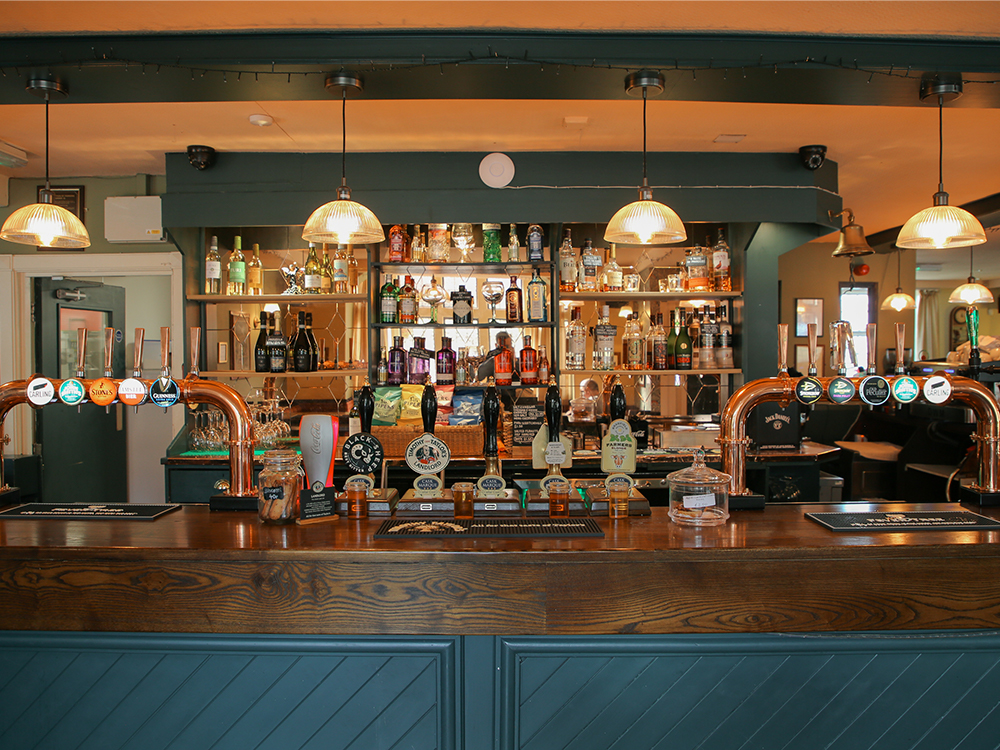 The interior of Walkley Cottage showing a well stocked bar.