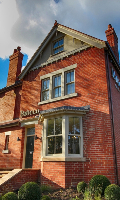 Exterior of an old Edwardian villa with traditional architectural details and period features.