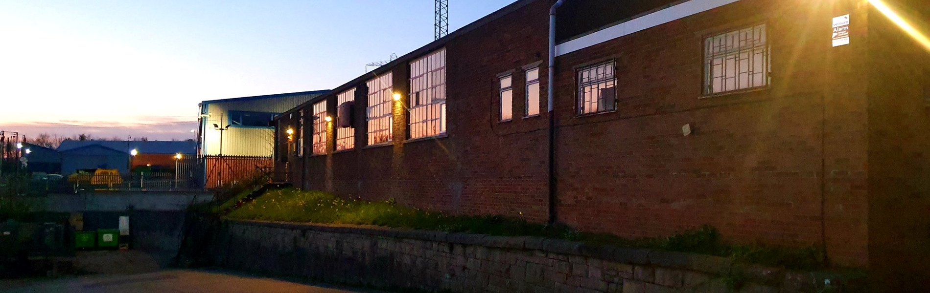 The exterior of Dryad Works at sunset.
